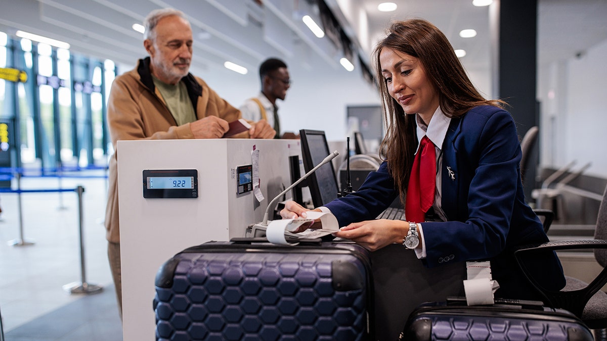 Man check bag on the airport istock