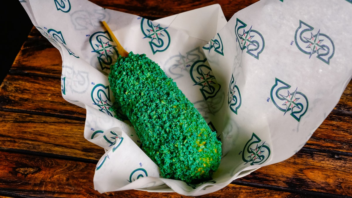 The What Up Corn Dog at T-Mobile Park is in Seattle Mariners foil. The spicy crust is also Mariners blue.