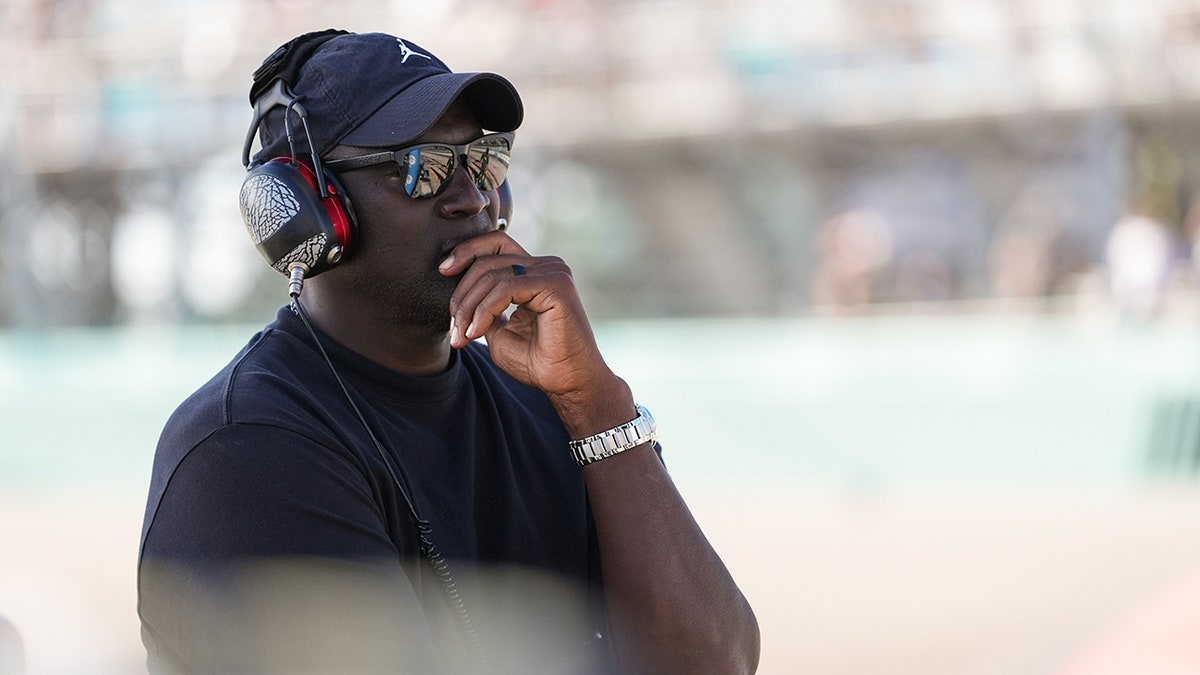 Michael Jordan watches an event