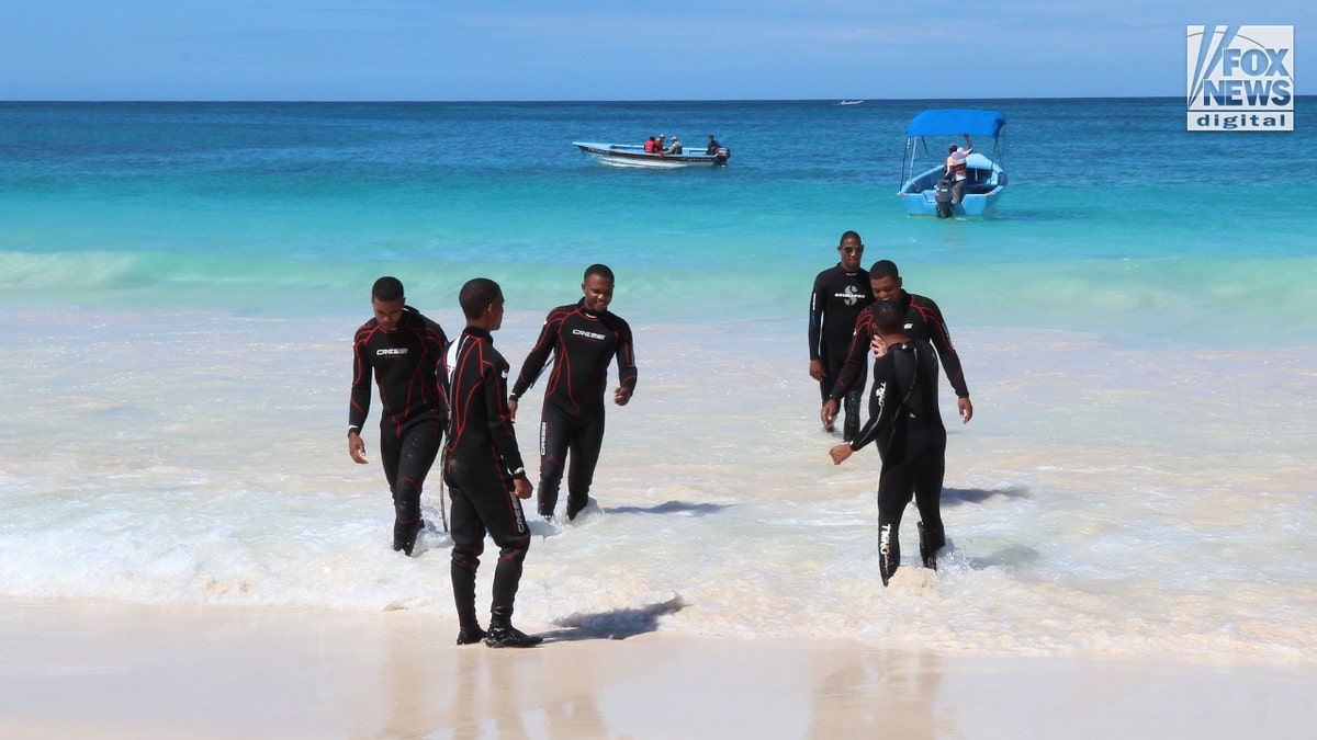 Sudiksha Konanki search team on the beaches of the Riu Republica Resort in the Dominican Republic