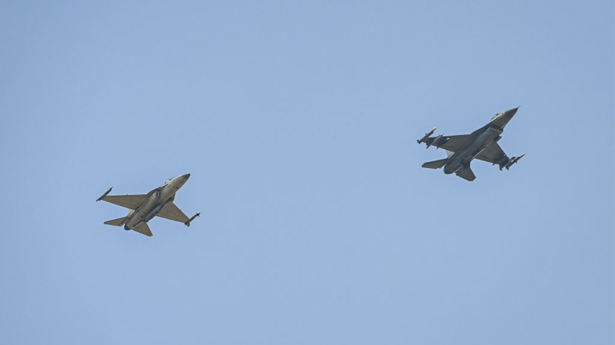 A Philippine Air Force FA-50 and U.S. Air Force F-16 fighter jet