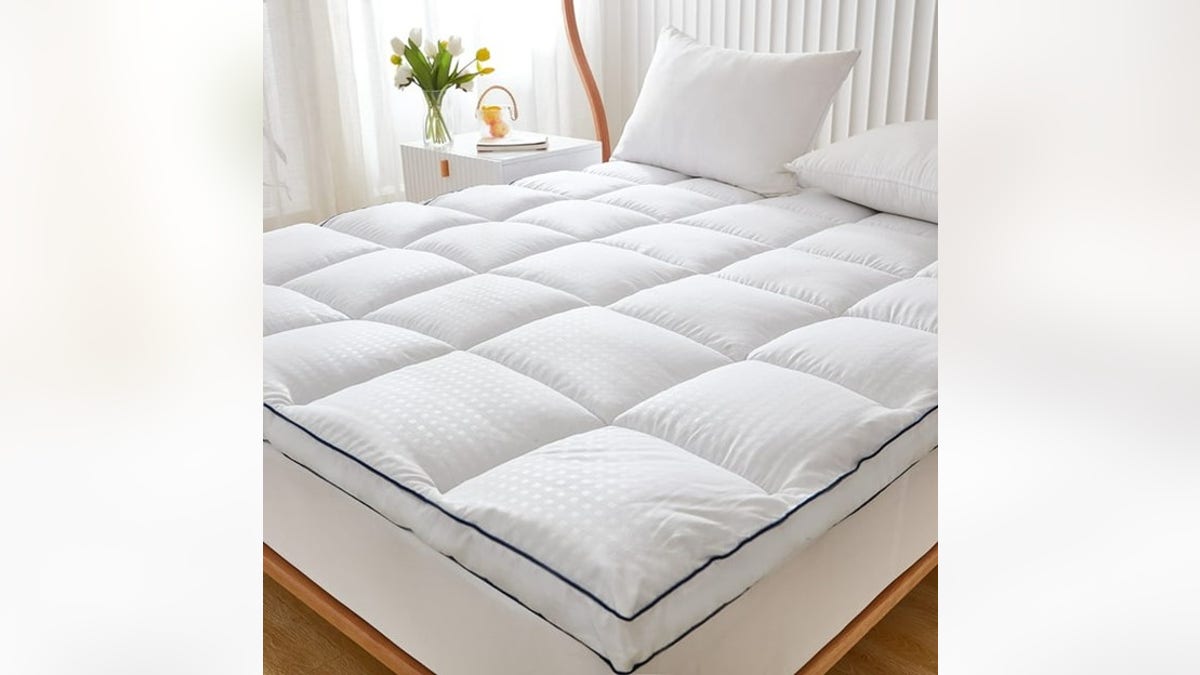 Sleep more peacefully with this soft mattress topper.?