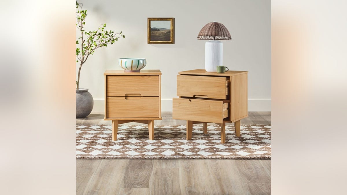 Decorate your room with a set of solid wood mid-century modern side tables. 