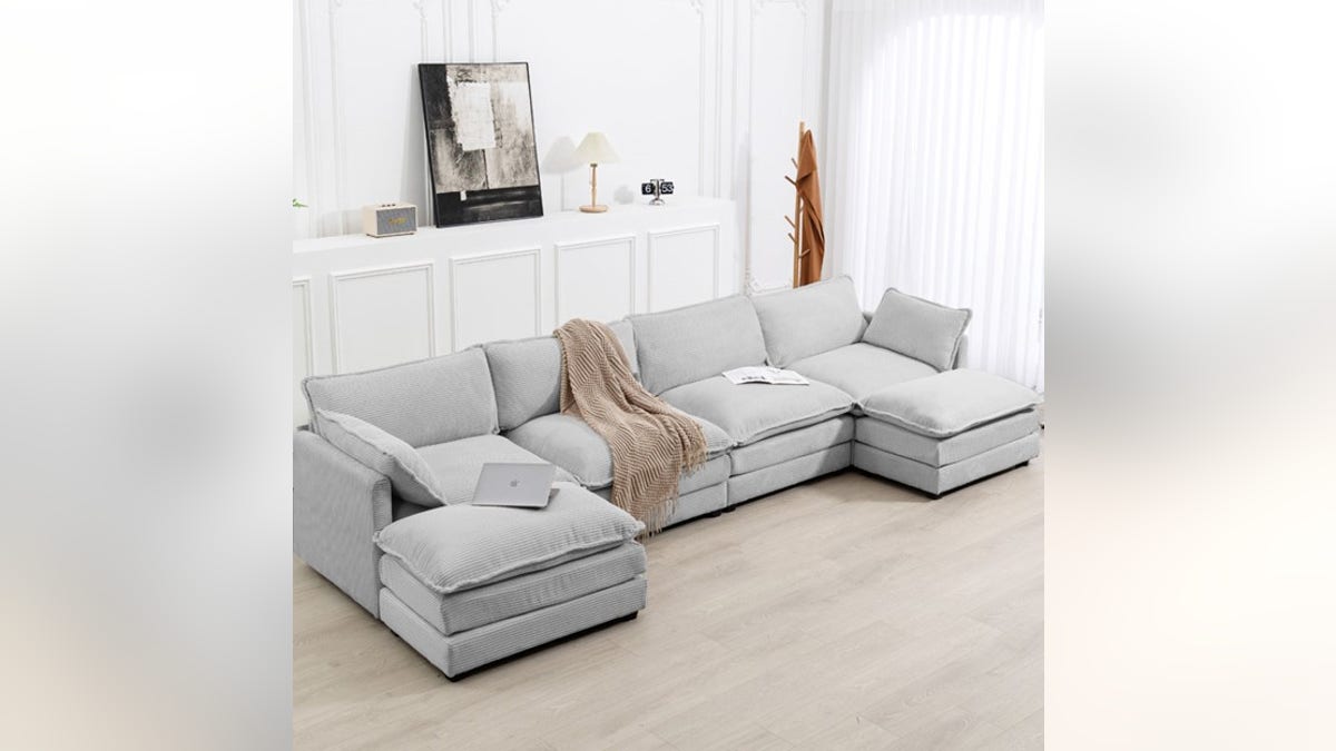Change the shape of your couch with a detachable ottoman.