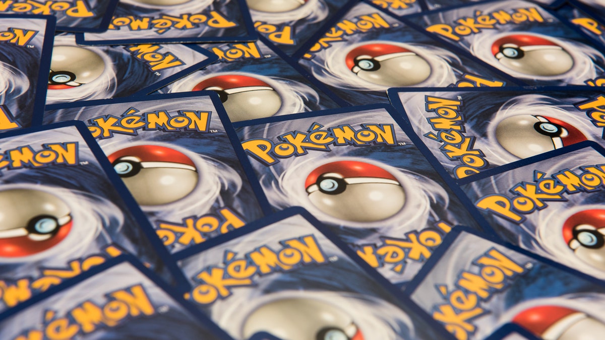 Pokémon trading cards are displayed.