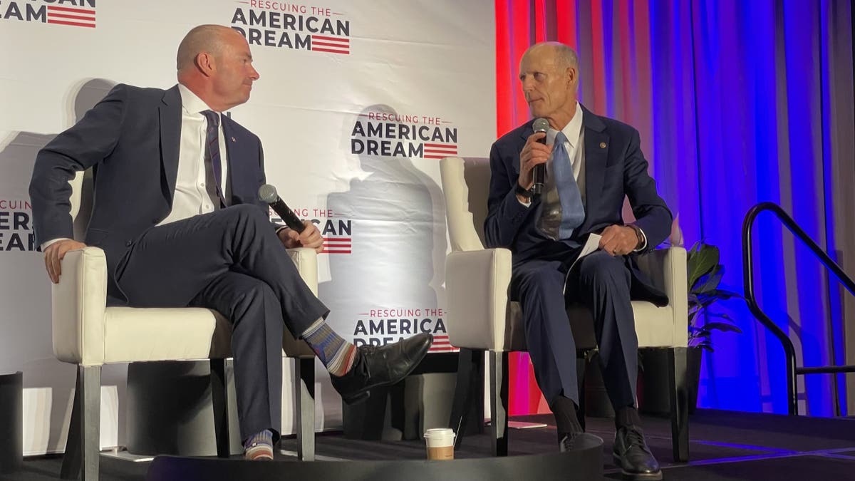 Republican Sens. Rick Scott of Florida (right) and Mike Lee of Utah (left) take part in a panel at a conservative policy summit hosted by a Scott-aligned group, in Washington D.C. on March 6, 2025