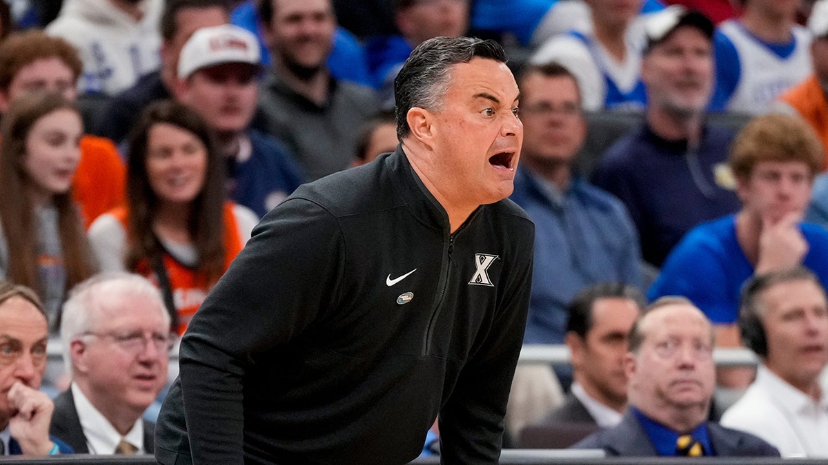 Sean Miller screams at the court