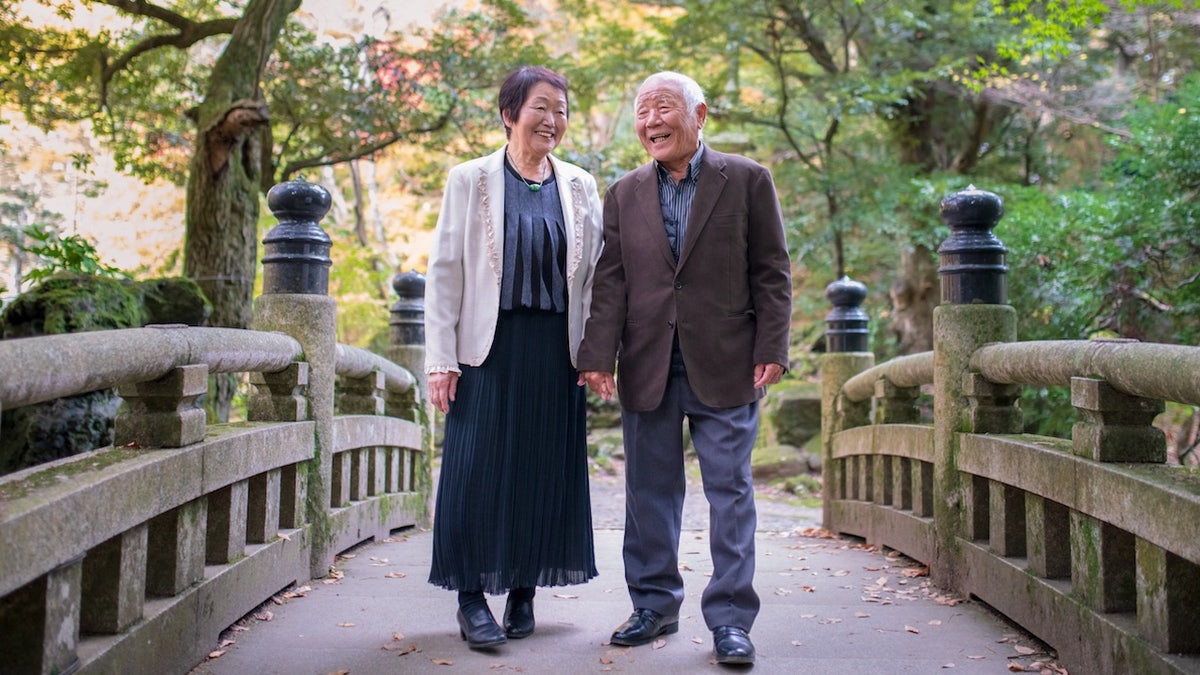 Elderly couple walking