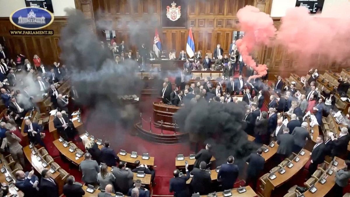 Serbian opposition lawmakers throw smoke grenades, tear gas in ...