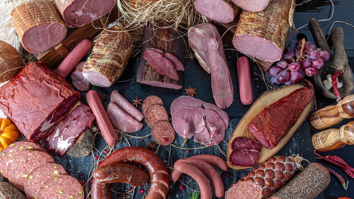 An assortment of cold and processed meat products.