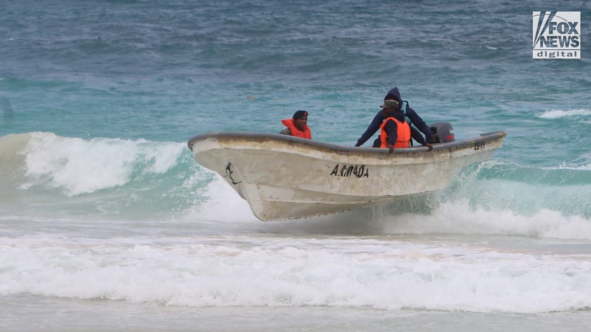 Sudiksha Konanki search team on the beach of RIU Republic Resort in Dominican Republic