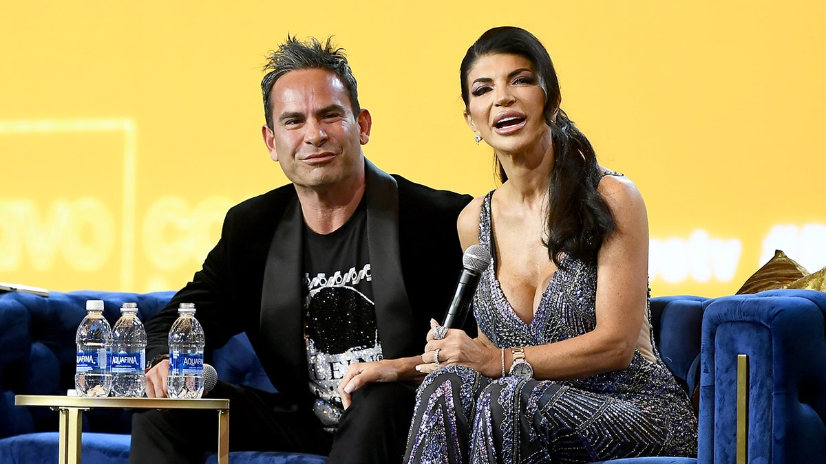 Teresa Giudice glitters on her jumpsuit next to her husband Luis Ruelas.