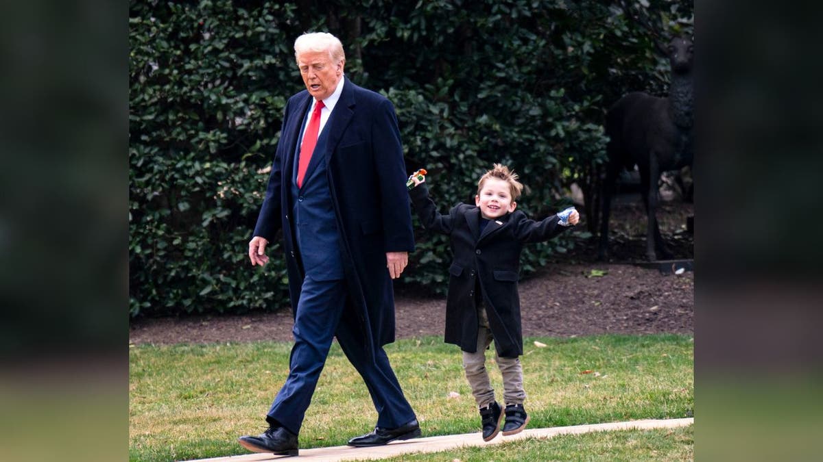 President Donald Trump and Elon Musk's son, "Lil X ,," On the southern turf on March 14, 2025 in Washington, DC. Trump went to Mar-A-Lago in Palm Beach, Florida at the weekend.