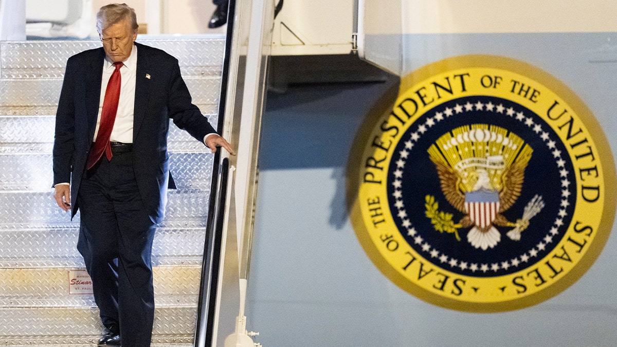 President Donald Trump deplaning Air Force One