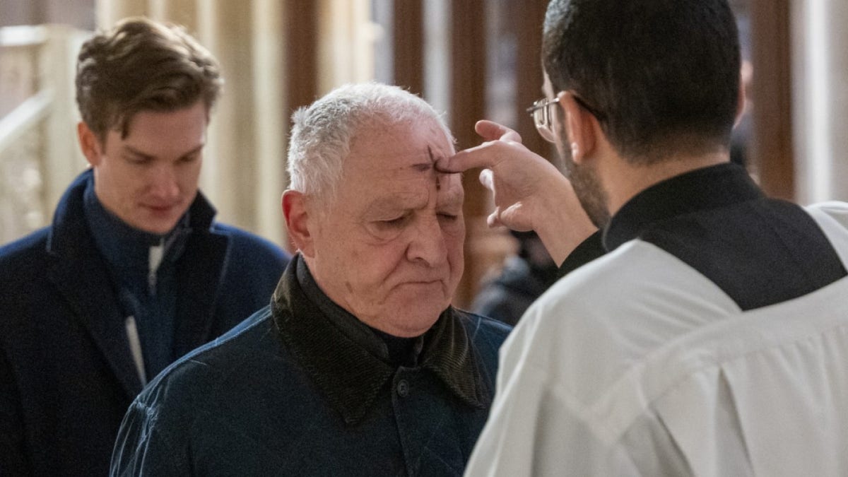  People get the sign of the cross placed on their forehead by a priest at St. Patricks Cathedral on Ash Wednesday on February 14, 2024 in New York City. Ash Wednesday marks the start of Lent for Catholics, a 40-day season of prayer, fasting and giving in preparation for the day of Christ's resurrection, celebrated on Easter Sunday. (Photo by Spencer Platt/Getty Images)