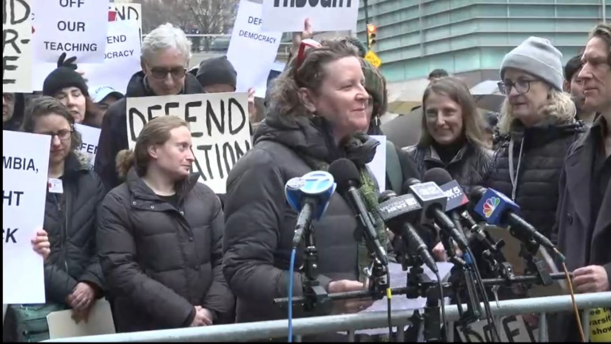 Columbia faculty held an "emergency vigil" outside the university's gates to protest recent policy changes.