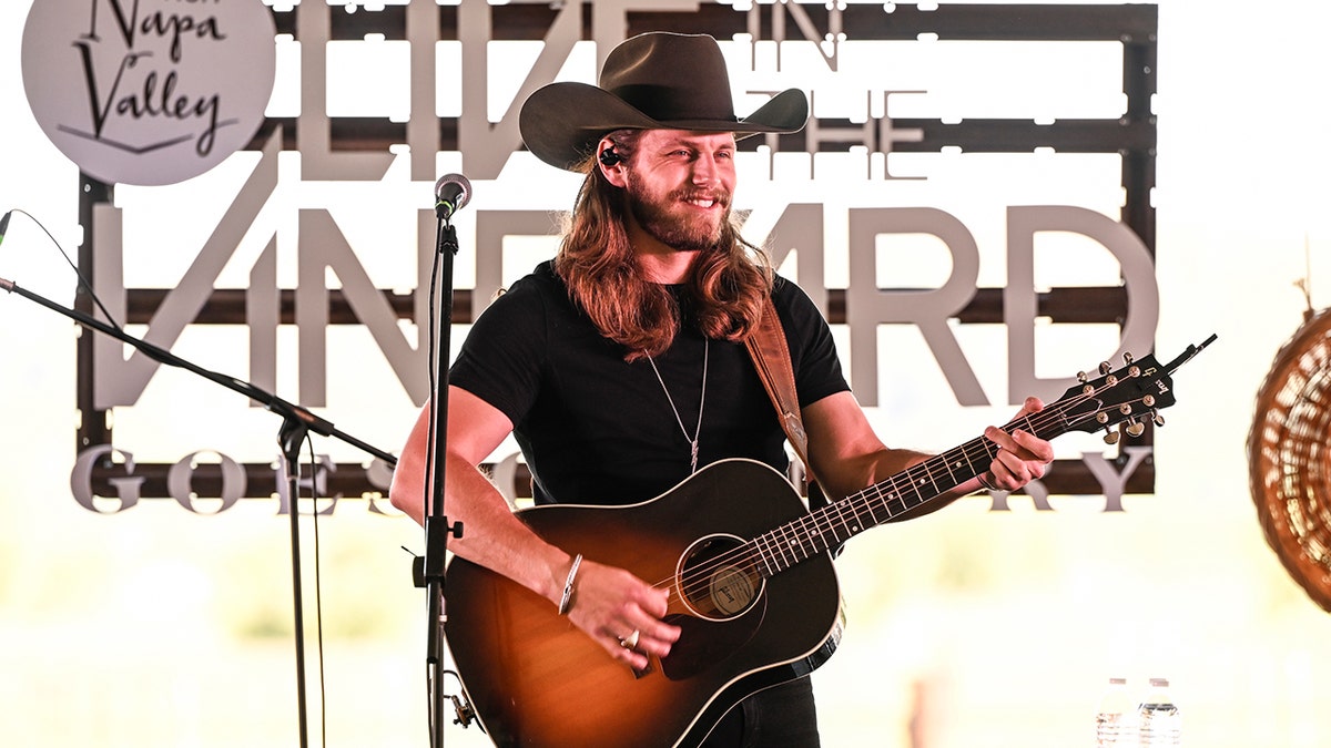 Warren Zeiders playing guitar