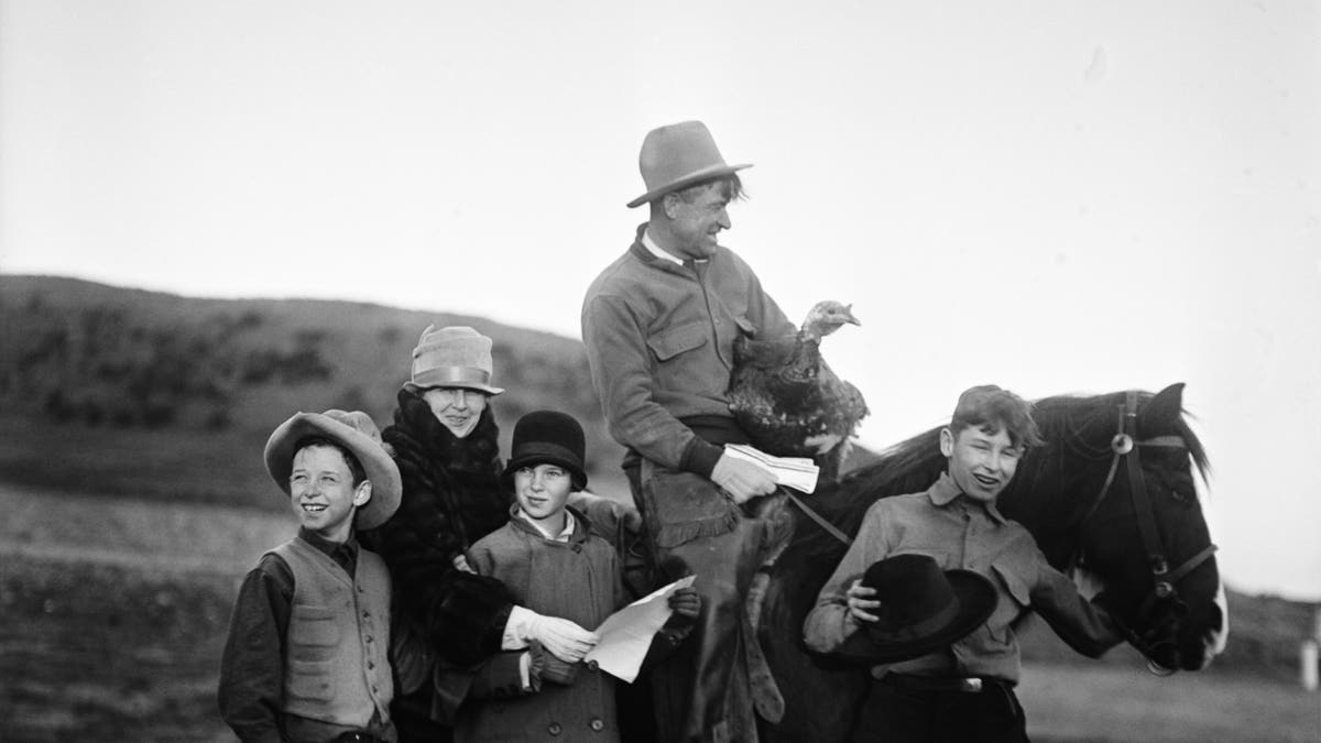 Will Rogers with his wife and kids