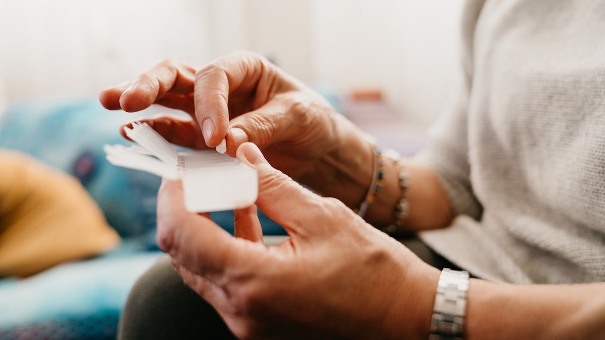 A woman takes birth control pills