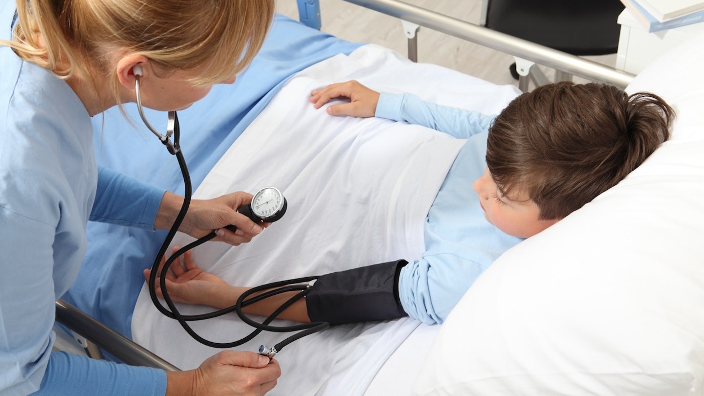 child in hospital bed