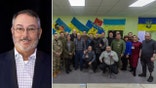 Retired Lt. Col Jim Lorraine, left, American Warrior Partnership and Ukrainian soldiers, right
