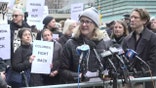 Columbia faculty held an "emergency vigil" outside the university's gates to protest recent policy changes.