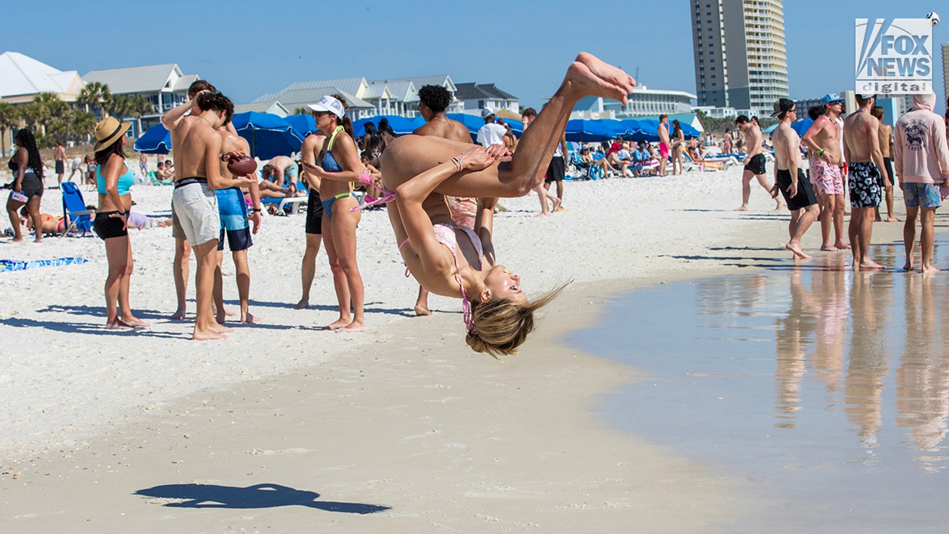 backflip on the beach 