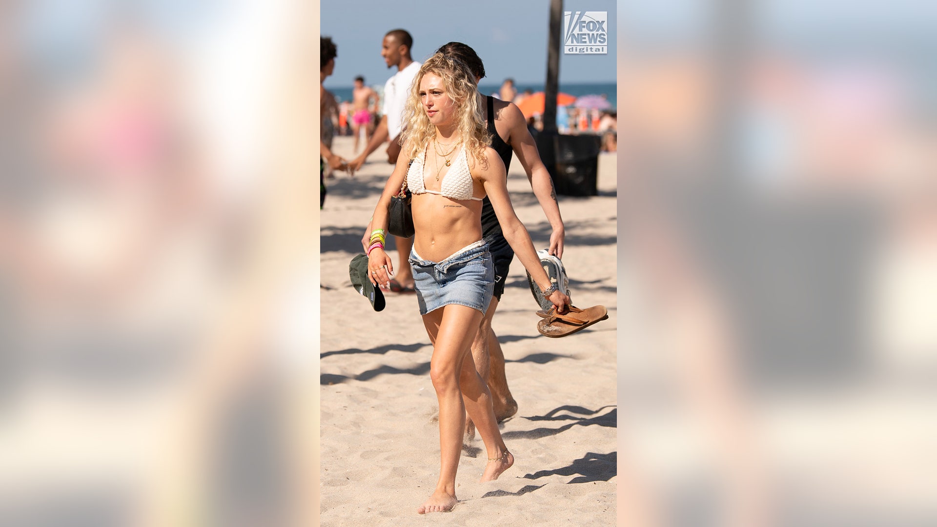 Spring breaker walking on the beach