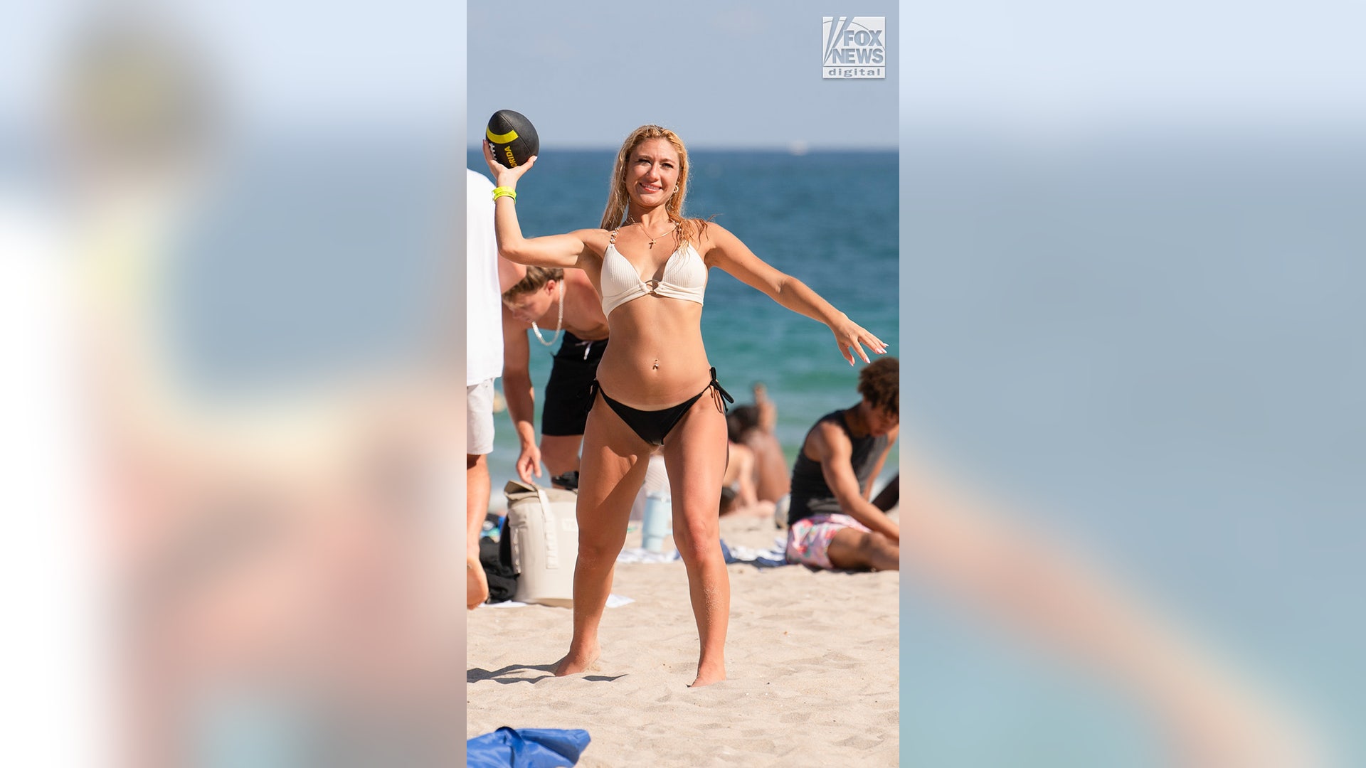 Spring breakers throws football