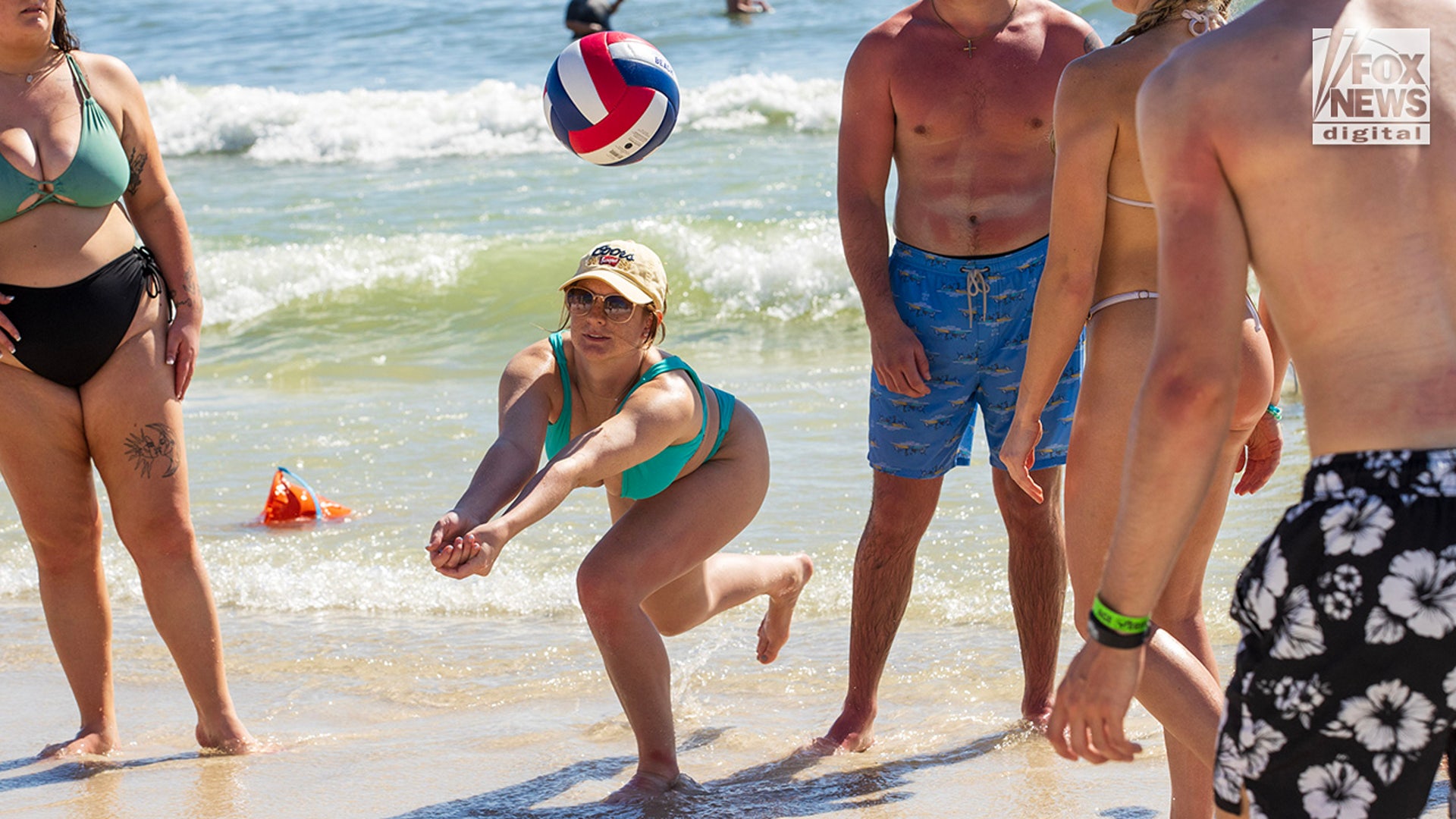 spring breaker plays volleyball