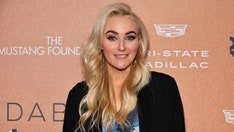 Broadway actress faces criticism for reading national anthem lyrics from phone during performance before game