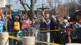 Satanic prayer ending with 'Hail Satan' opens Ottumwa City Council meeting in Iowa - Fox News