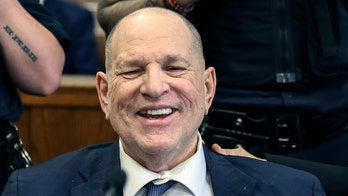 Harvey Weinstein's smile reveals missing teeth in court as judge hammers out rules for upcoming rape retrial