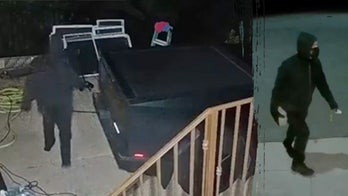 Masked Tesla vandal wrecks Cybertruck, leaves note for homeowner in attack caught on video
