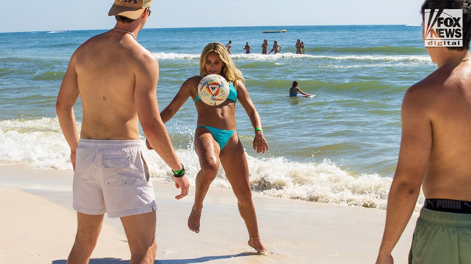Florida spring breakers playing on the beach