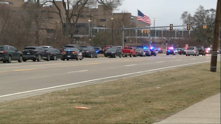 Police vehicles seen outside hospital in Troy, Michigan after shooting