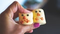 Woman holding marshmallows yellow chicks for easter - Fox News