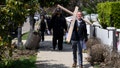 Pastor John Shaver, right, carries a cross during a Cross Walk event by the Community United Methodist Church of the Pacific Palisades, Friday, April 18, 2025, in the Pacific Palisades area of Los Angeles. - Fox News