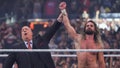 Paul Heyman raises Seth Rollins' hand after Rollins' Triple Threat match victory over CM Punk and Roman Reigns, both not pictured, during WrestleMania 41 at Allegiant Stadium on April 19, 2025 in Las Vegas, Nevada. - Fox News