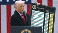 US President Donald Trump holds a chart as he delivers remarks on reciprocal tariffs during an event in the Rose Garden entitled "Make America Wealthy Again" at the White House in Washington, DC, on April 2, 2025. Trump geared up to unveil sweeping new "Liberation Day" tariffs in a move that threatens to ignite a devastating global trade war. Key US trading partners including the European Union and Britain said they were preparing their responses to Trump's escalation, as nervous markets fell in Europe and America. (Photo by Brendan SMIALOWSKI / AFP) (Photo by BRENDAN SMIALOWSKI/AFP via Getty Images) - Fox News