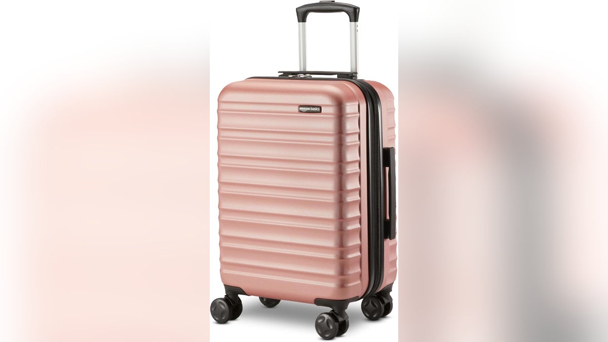 This Amazon Basics suitcase offers a durable hard shell, double spinner wheels and a scratch-resistant surface.