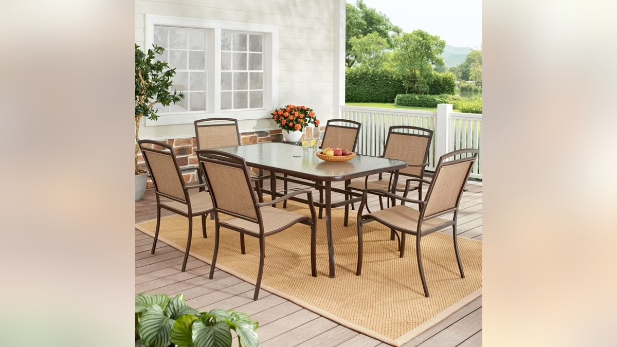 This Mainstays 7-piece set at Walmart includes a tempered glass-top table and six stackable chairs.