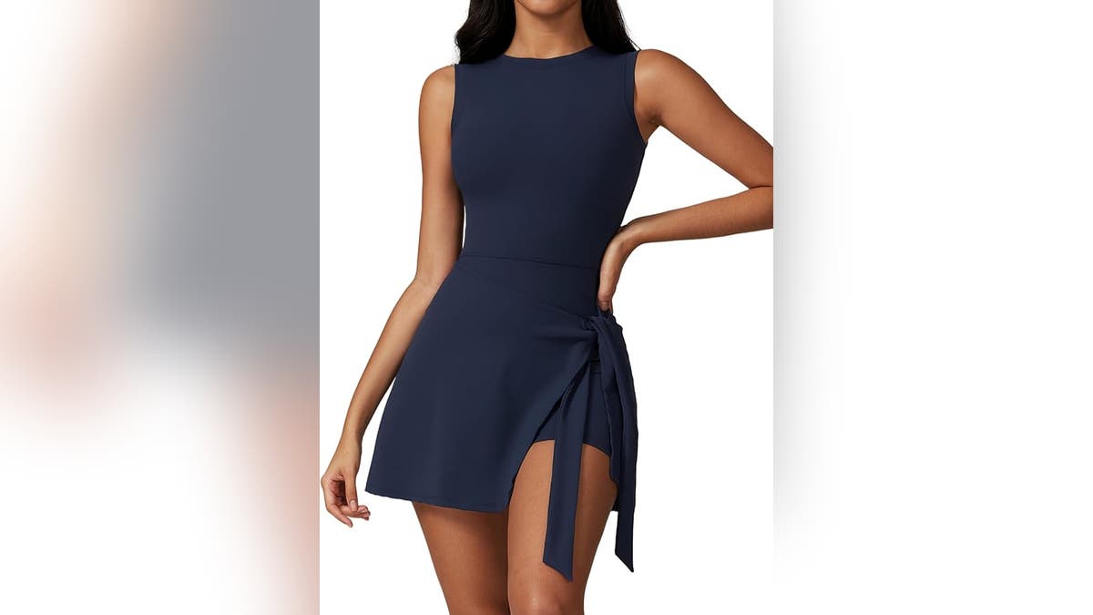 This Abehik wrap dress can easily be dressed up or down for any occasion, on or off the court.