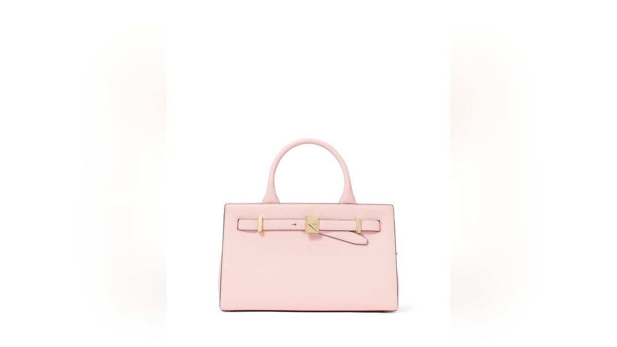 Blending the spaciousness of a tote with the structure of a crossbody, this Kate Spade satchel at Macy’s is a stylish and practical choice.