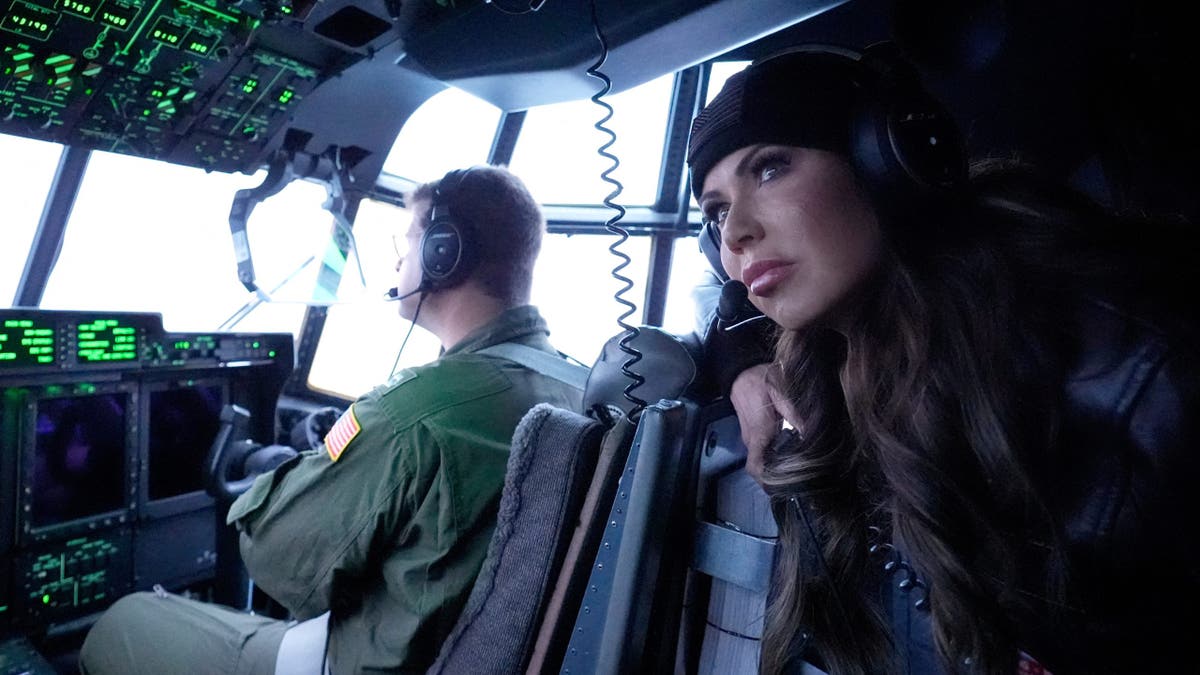 U.S. Homeland Security Secretary Kristi Noem looks out during an aerial tour on a HC-130J from U.S. Coast Guard Air Station Kodiak on Monday, March 17, 2025 in Kodiak, Alaska.