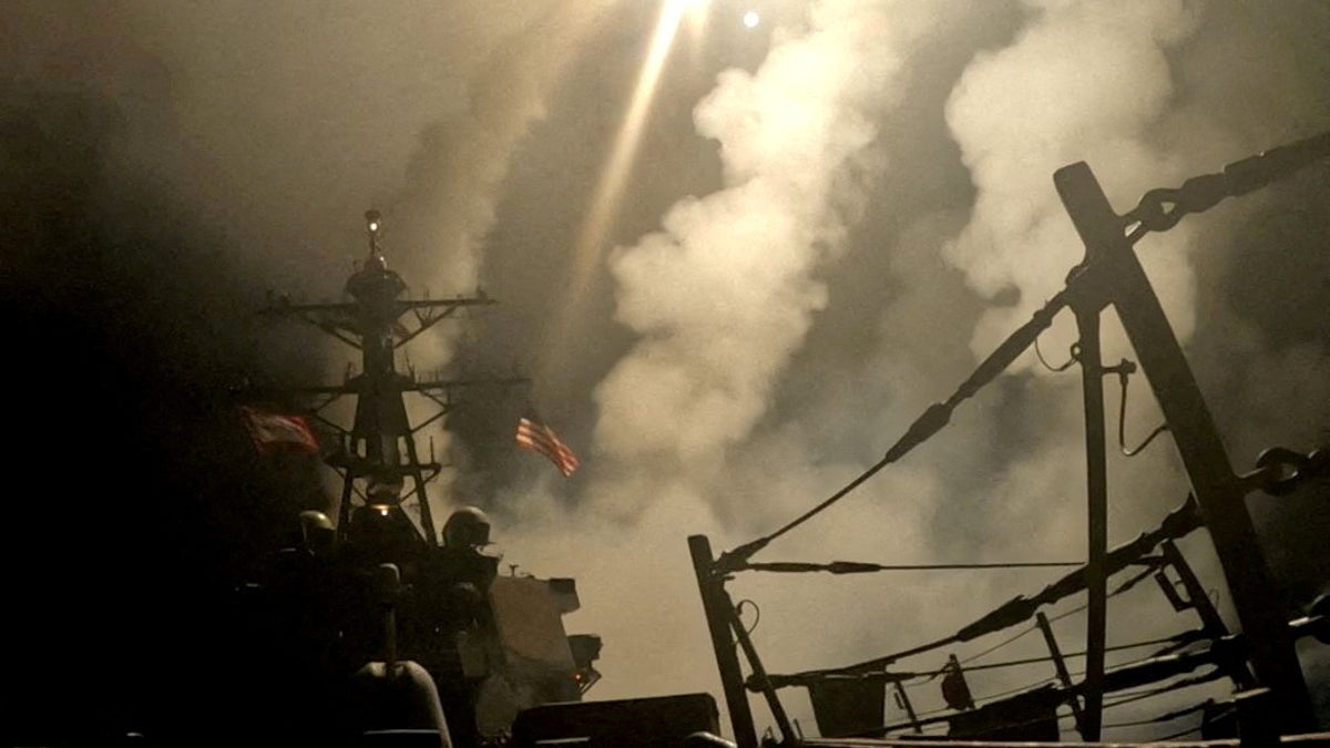  A ship fires missiles at an undisclosed location, after U.S. President Donald Trump launched military strikes against Houthis