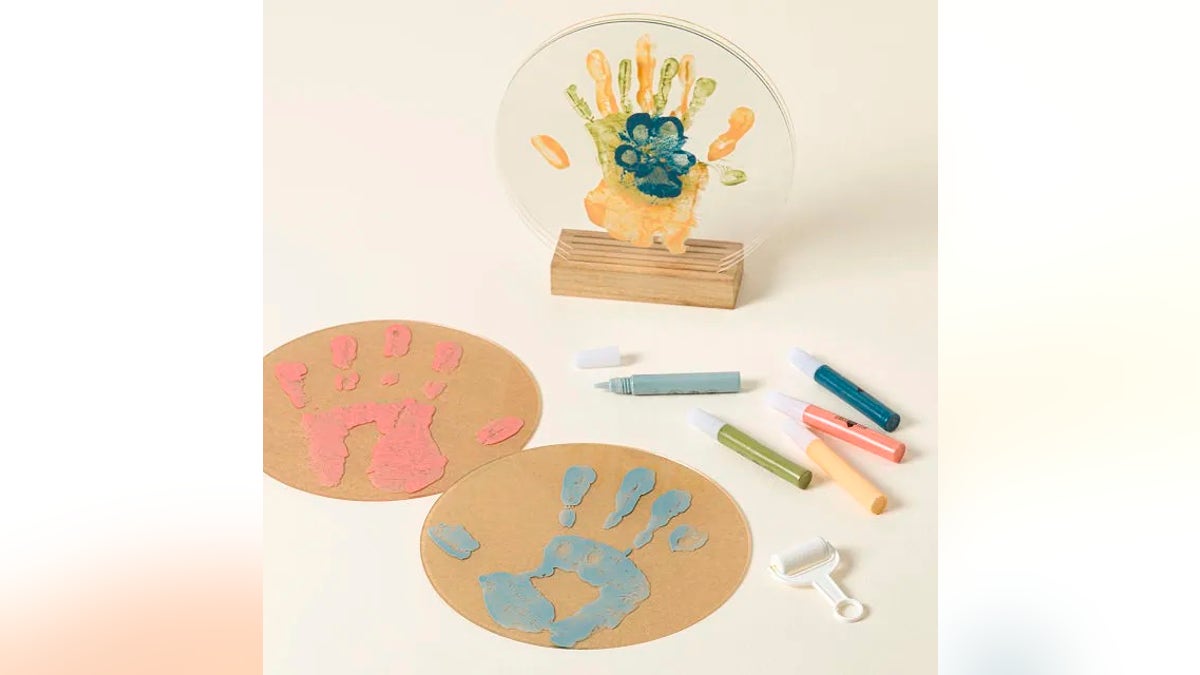 This Layers of Love handprint kit enables you to create a show featuring family members' handprints successful vibrant colors connected canvas aliases framed paper.