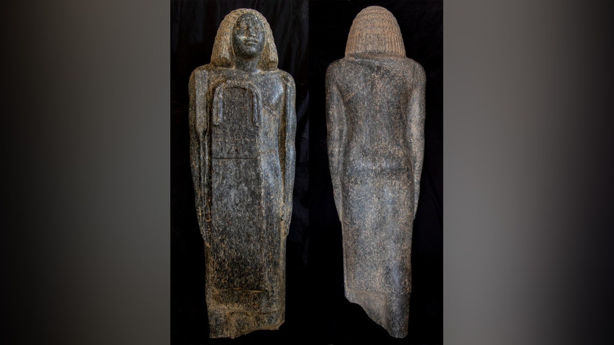 Black granite statue