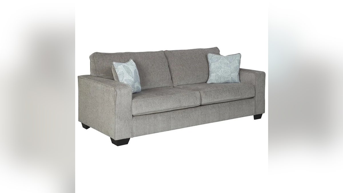 This Altari sleeper from Ashley Furniture has a minimalist design, plush cushions and 2  decorative propulsion  pillows. 