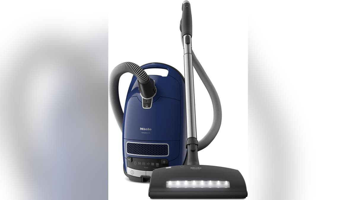 A high-tech vacuum with plenty of attachments.